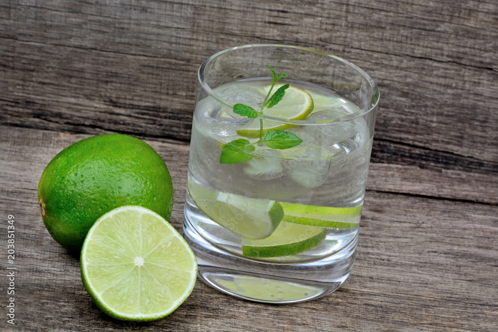 Water with fresh lime in a glass Water with fresh lime in a glass