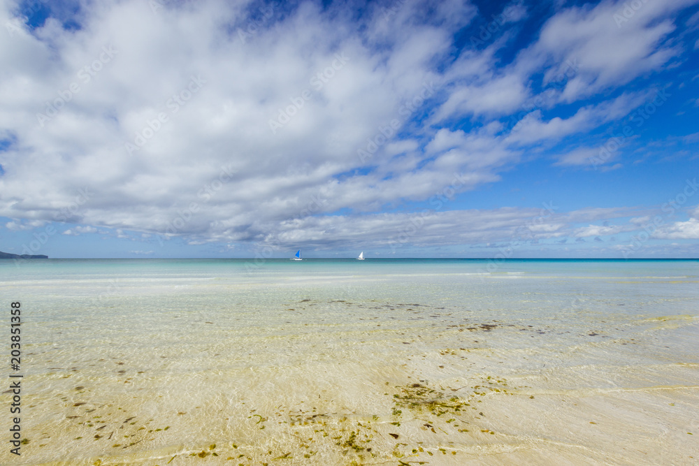 Double outrigger sailboats on the sea