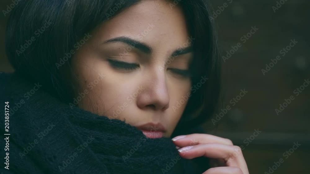 Sad Pensive cute filipino Woman In The Street. Close Up Portrait Sad Pensive cute filipino Woman In The Street. Close Up Portrait