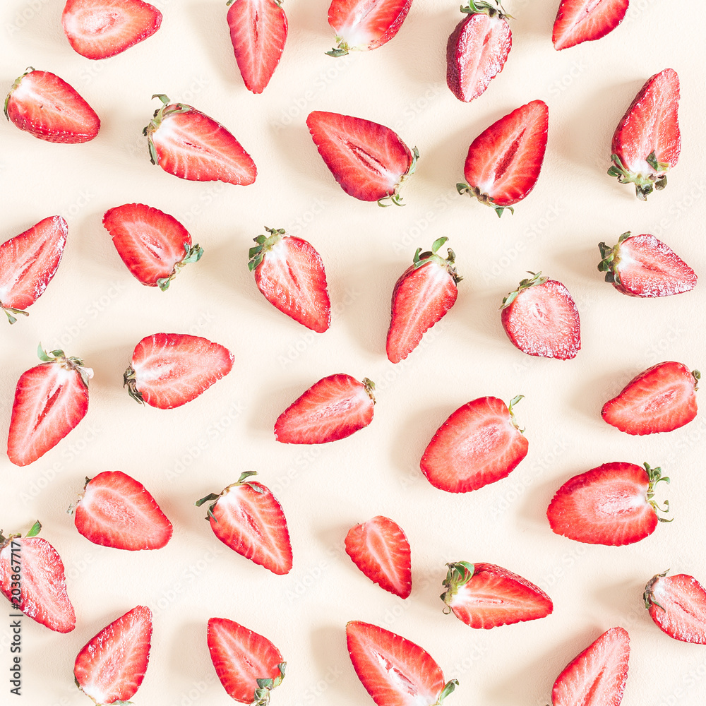 Strawberry pattern on pastel yellow background. Summer concept. Flat lay, top view, square Strawberry pattern on pastel yellow background. Summer concept. Flat lay, top view, square
