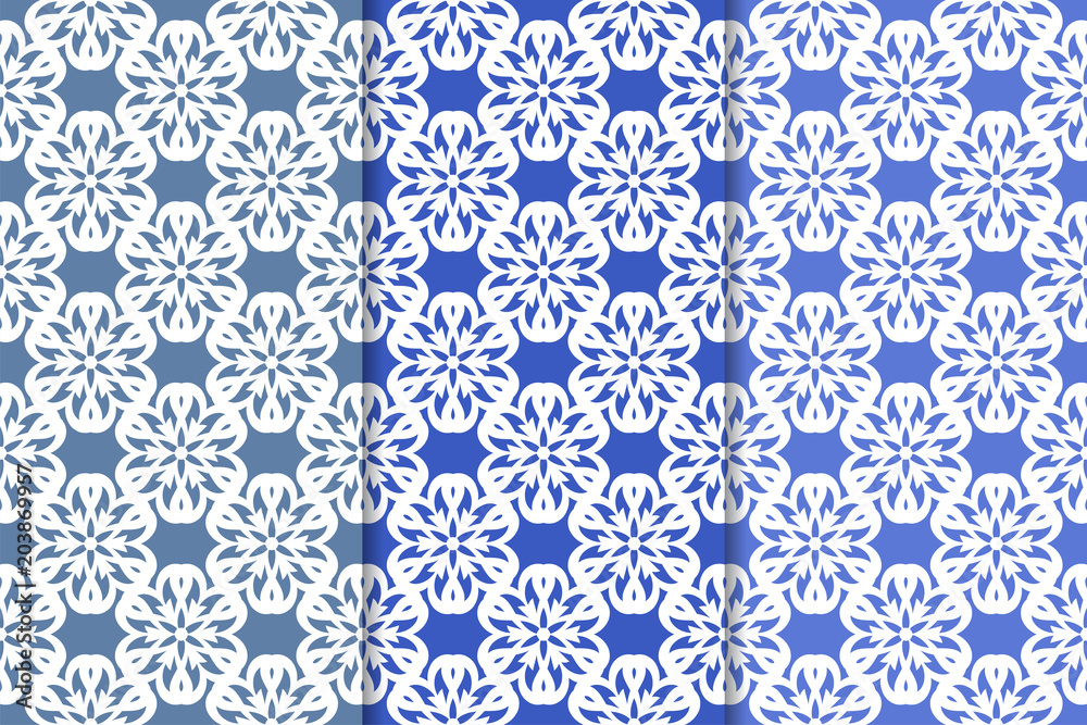 Set of floral ornaments. Vertical blue seamless patterns