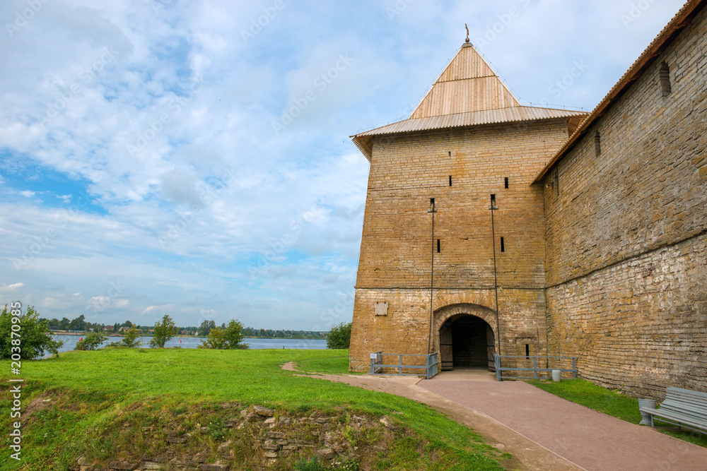 Fortress in the source of the Neva River, Russia, Shlisselburg: Fortress Oreshek. Medieval Russian defensive structure and political prison. Fortress walls and towers. It was founded in 1323. Water