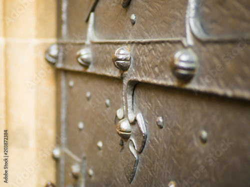 texture of a metal canvas of an old forged door photo