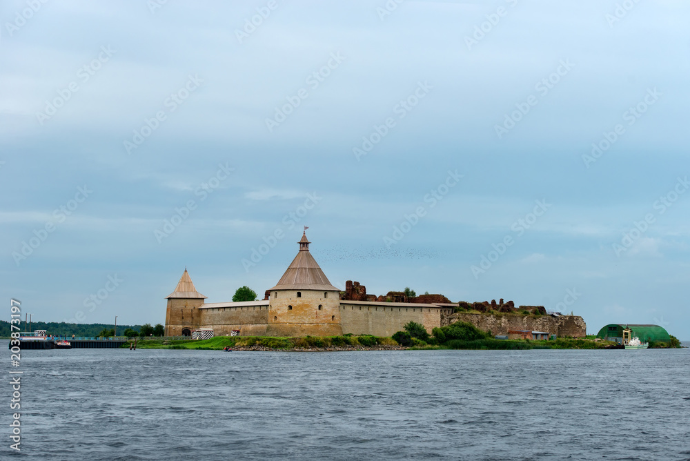 Fortress in the source of the Neva River, Russia, Shlisselburg: Fortress Oreshek. Medieval Russian defensive structure and political prison. Fortress walls and towers. It was founded in 1323. Water