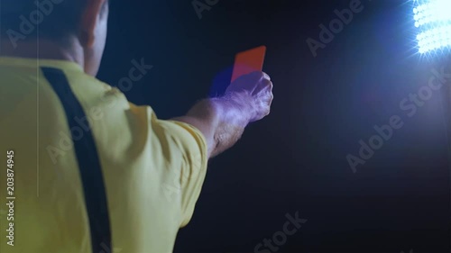 Football soccer referee shows penalty red card