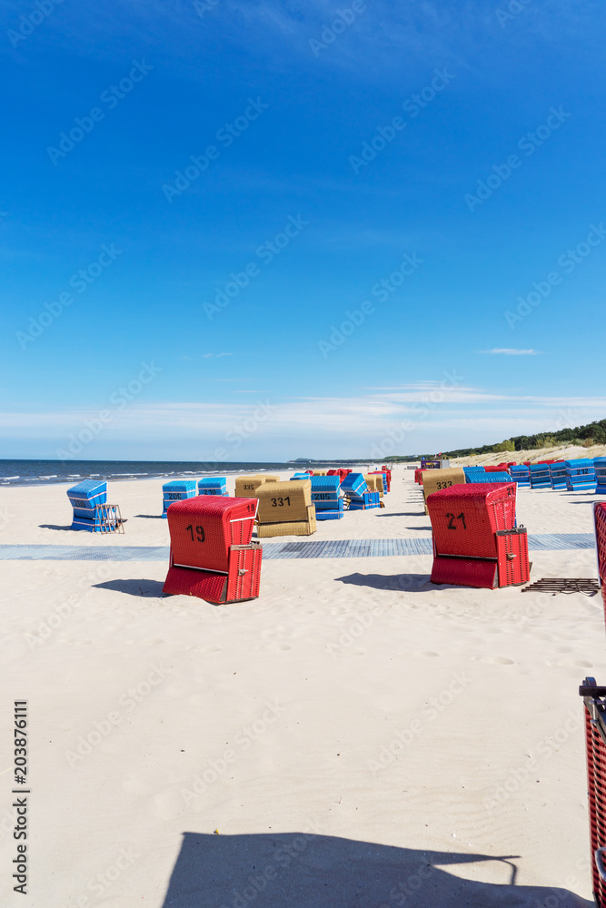 Red beach chairs on a sunny day at the Baltic Sea Red beach chairs on a sunny day at the Baltic Sea