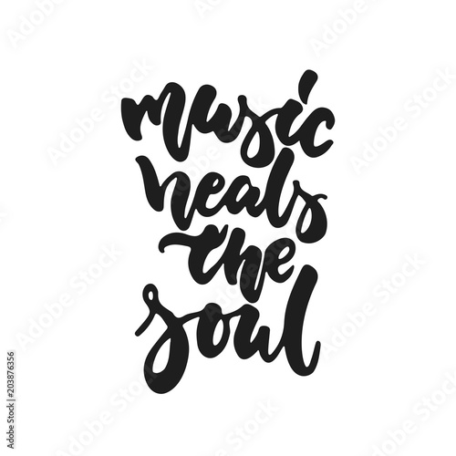 Music heals the soul - hand drawn lettering quote isolated on the white background. Fun brush ink vector illustration for banners, greeting card, poster design, photo overlays.