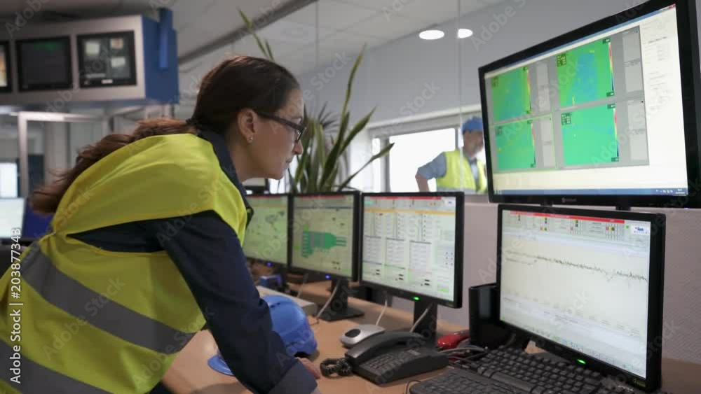 Industrial technician working in monitoring control room