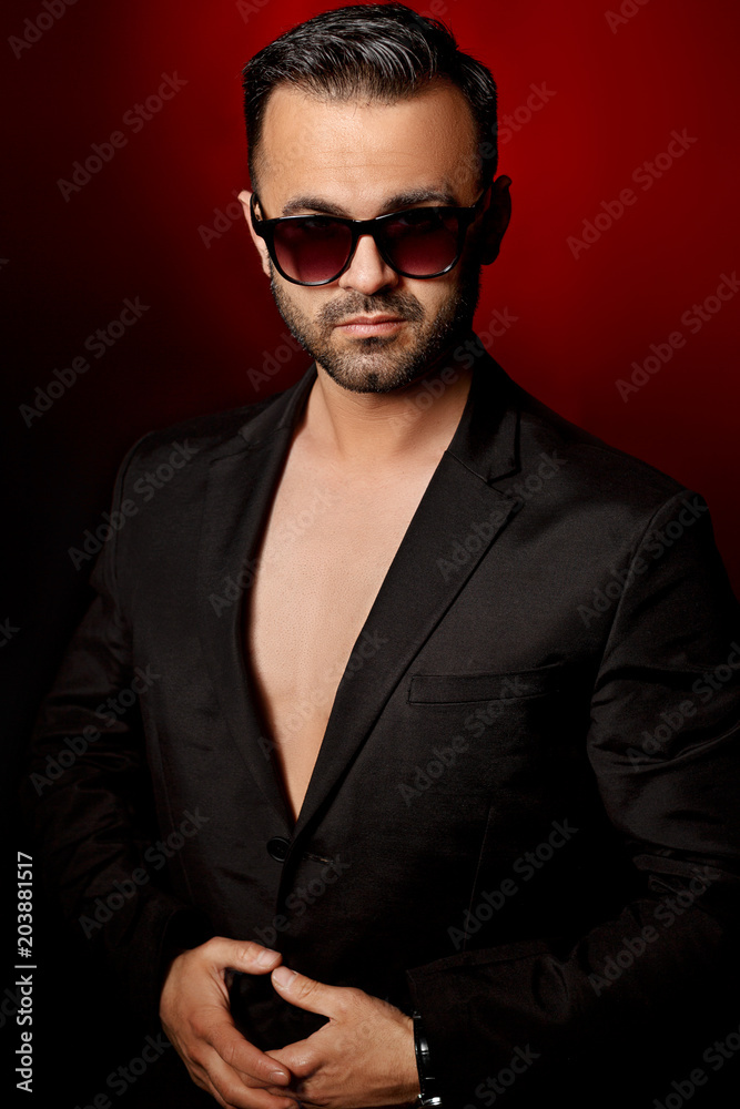 man in sunglasses and suit man in sunglasses and suit