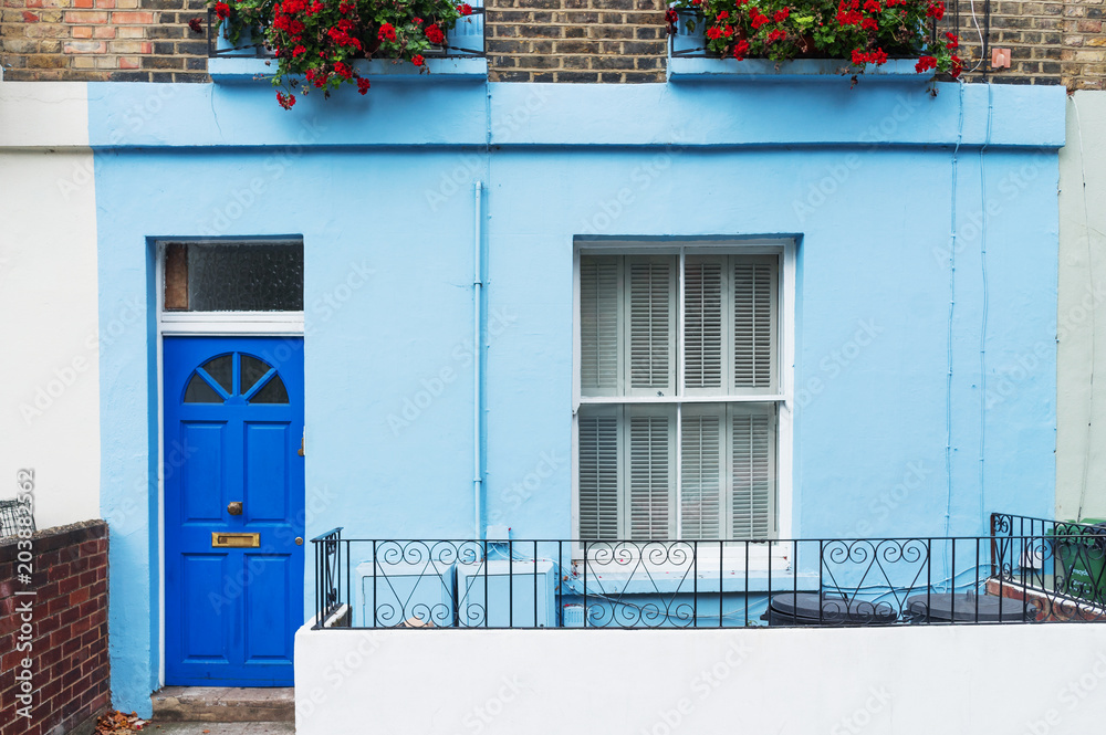 Typical British blue house facade in London city center, England, UK