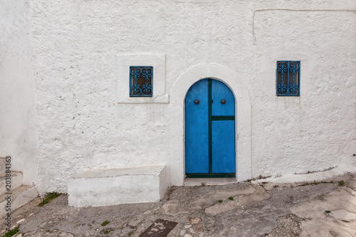 Peschici (Puglia, Italy) - View of the little picturesque village in south Italy with its colored doors