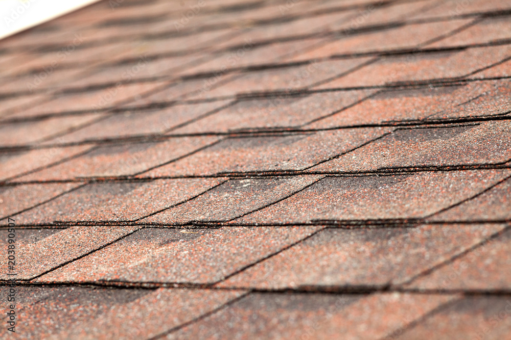 Obraz premium Close up of new roof with asphalt shingles