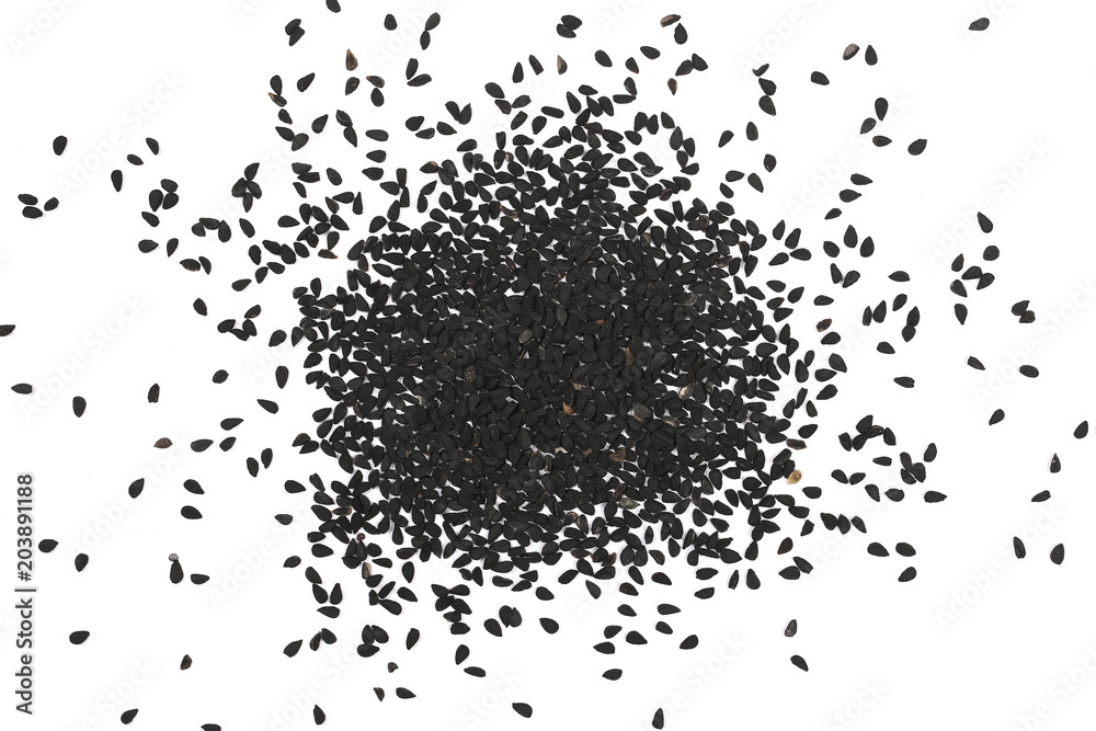 Pile of black cumin seeds isolated on white background, top view Pile of black cumin seeds isolated on white background, top view