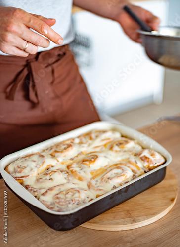 buns with cinnamon and cream photo