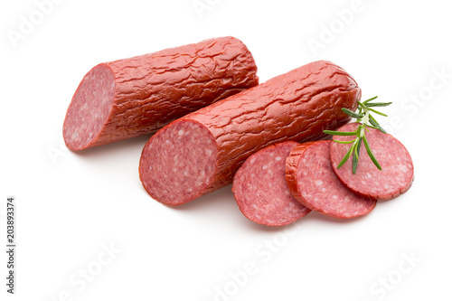 Salami smoked sausage, basil leaves on white background cutout.