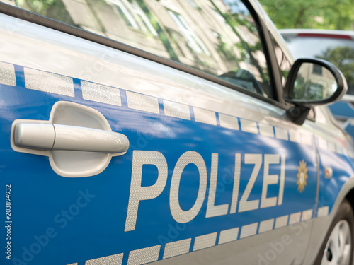 German News Concept: Blue Police Car, Selected Focus