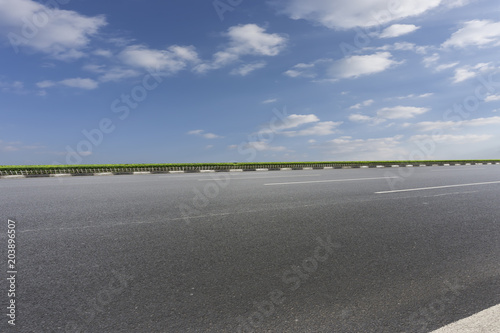 Empty highway asphalt road and beautiful sky landscape © 昊 周