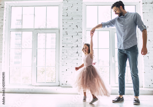 Dad with daughter at home