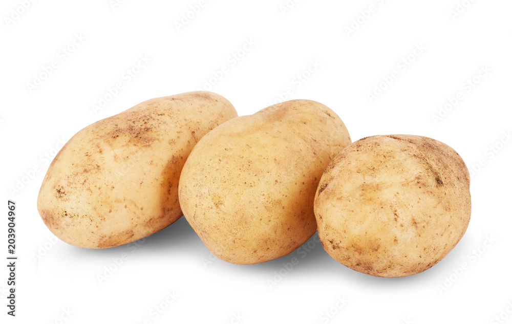 Three large, young potatoes on a white background Three large, young potatoes on a white background