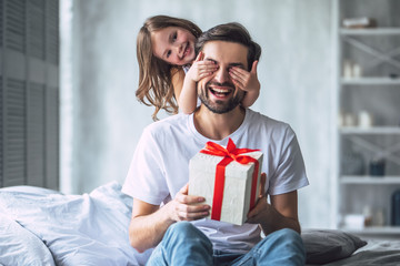 Dad with daughter at home