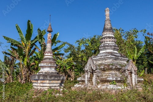 Two ancient buddhist pagodas in Hsipaw, Myanmar. Old stupas. Version 2. photo