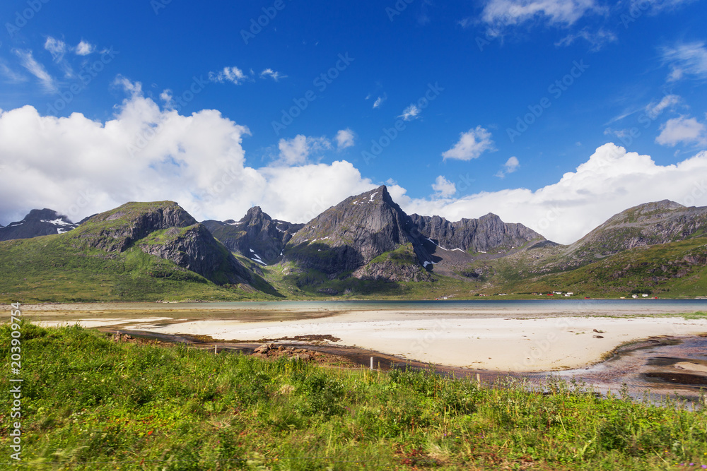 Beautiful scandinavian landscape with mountains and fjords. Car trip on Lofoten islands, Norway.