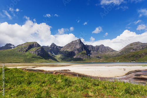 Beautiful scandinavian landscape with mountains and fjords. Car trip on Lofoten islands, Norway.