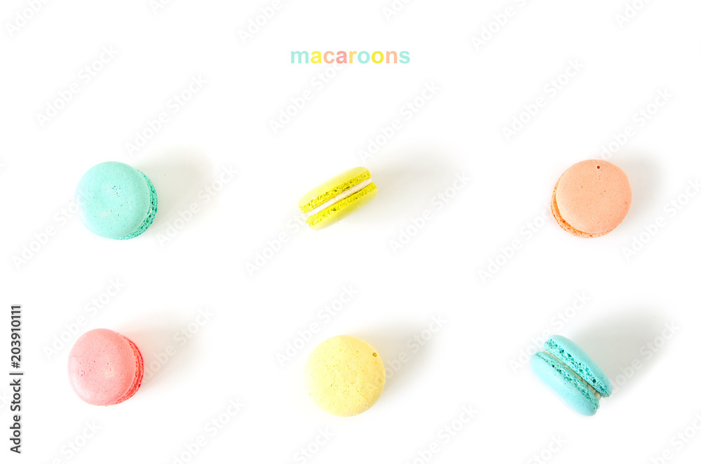 French macaron cookies on white background.Sweet dessert. French macaron cookies on white background.Sweet dessert.