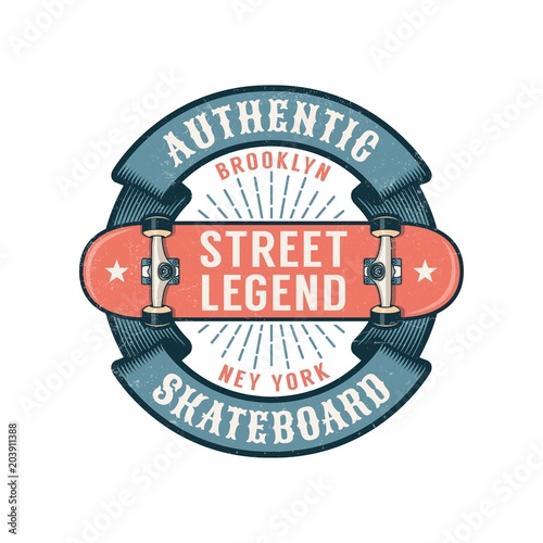 Hipster skateboarding logo with round ribbon and inverted skateboard. Worn textures on a separate layer. photo