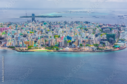 Fototapeta Naklejka Na Ścianę i Meble -  Aerial top view Male capital, Maldivian capital view from above, Male, Maldives.