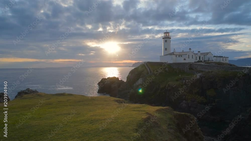 beautiful lighthouse on a cliff in Fanad, Ireland beautiful lighthouse on a cliff in Fanad, Ireland