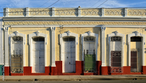 Photography Detail of the window with the beautiful colonial ornament in the Cienfuegos city