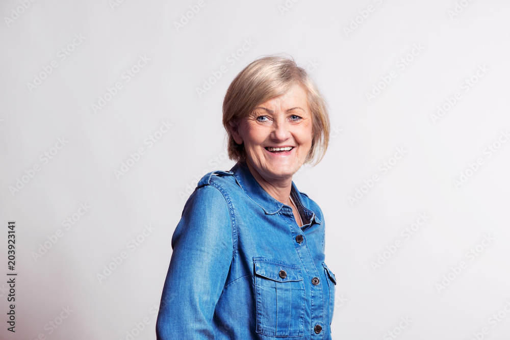 Portrait of a senior woman in studio. Portrait of a senior woman in studio.