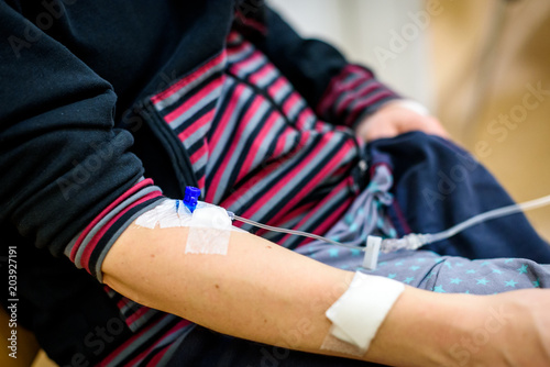 Intravenous therapy, infusion or iv in woman hand in hospital.