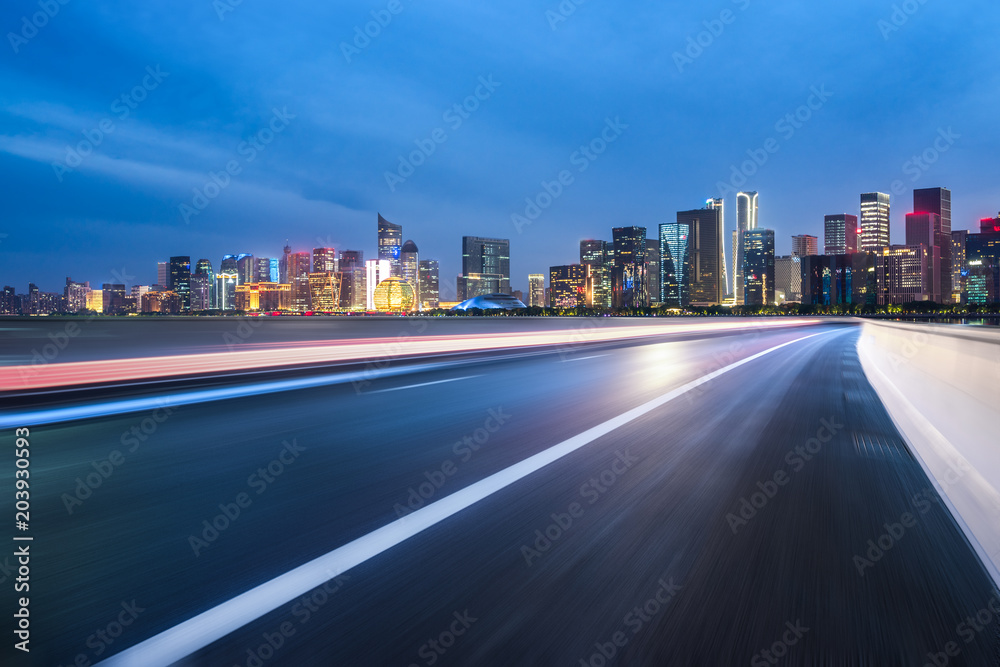 Fototapeta premium asphalt road with modern office building