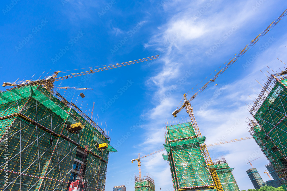 Naklejka premium crane in construction site