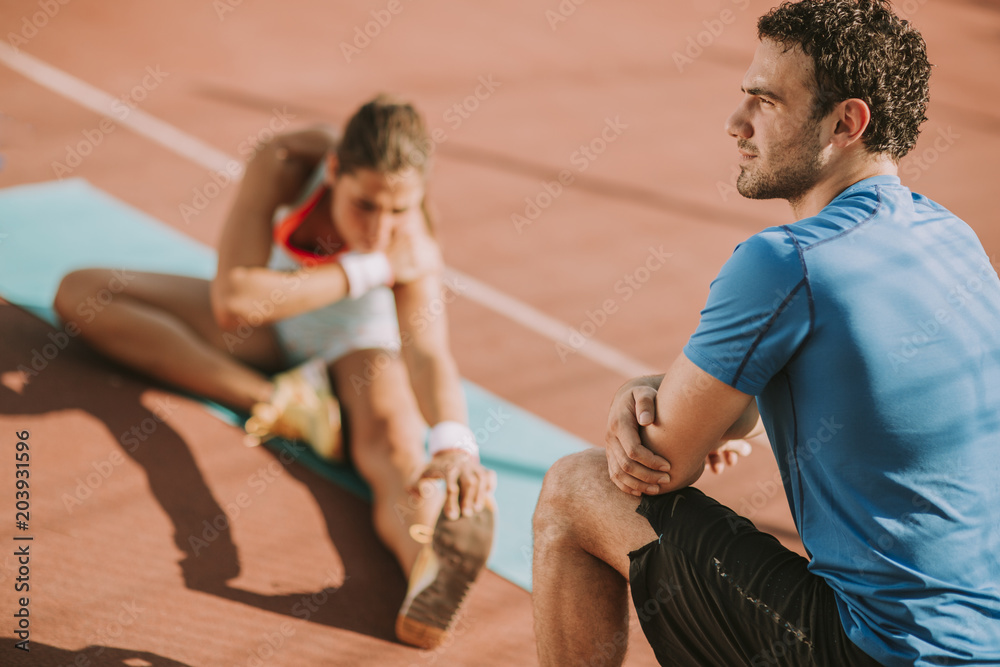Fototapeta premium Woman training with personal trainer