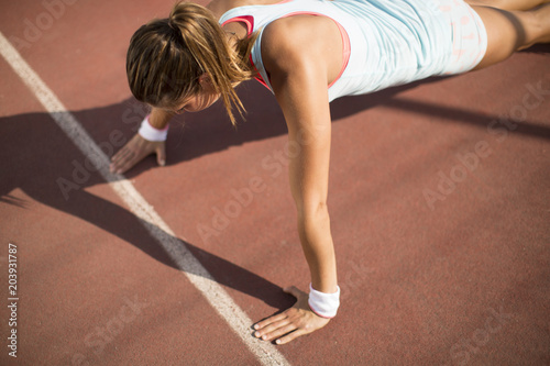 Young woman taking exercise