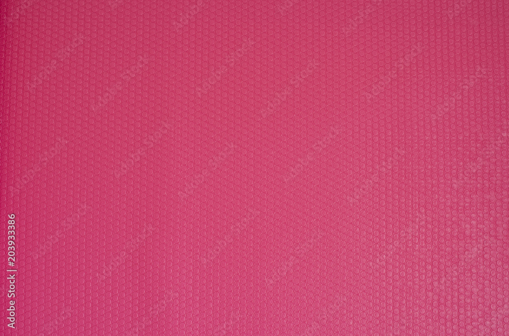 Pink Yoga Mat Rubber Texture Background. Fitness concept, active lifestyle, body care concept Pink Yoga Mat Rubber Texture Background. Fitness concept, active lifestyle, body care concept