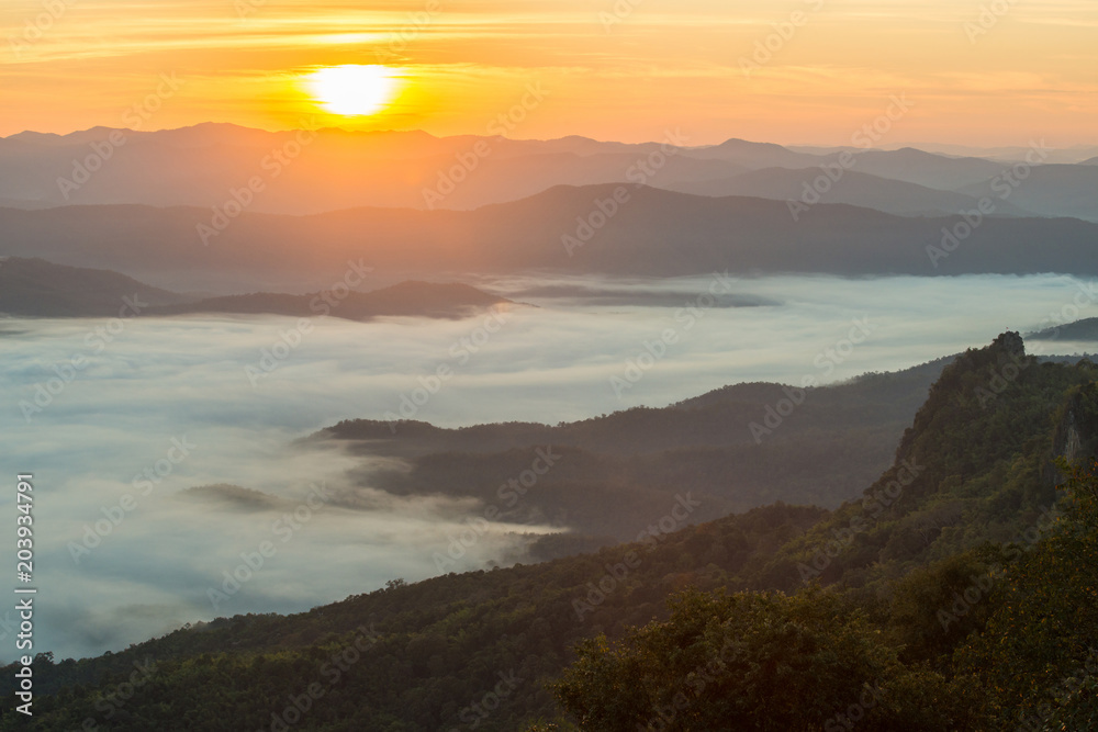 The beautiful sunrise over the mountains range in Doi Samer Dao national park of Nan province of Thailand.