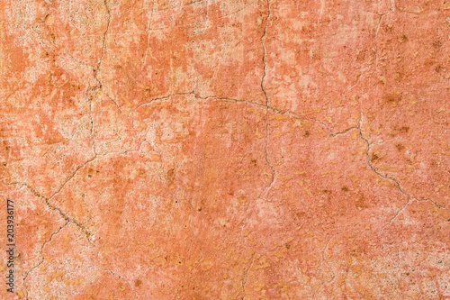 Brown adobe clay wall texture background. Material construction. Architectural detail. Vernacular architecture found in Africa and Asia. photo