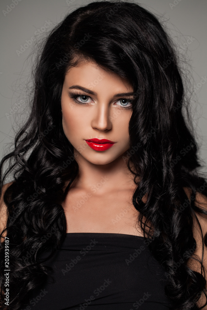 Brunette Hair Model. Beautiful Woman with Makeup and Permed Hairstyle Brunette Hair Model. Beautiful Woman with Makeup and Permed Hairstyle