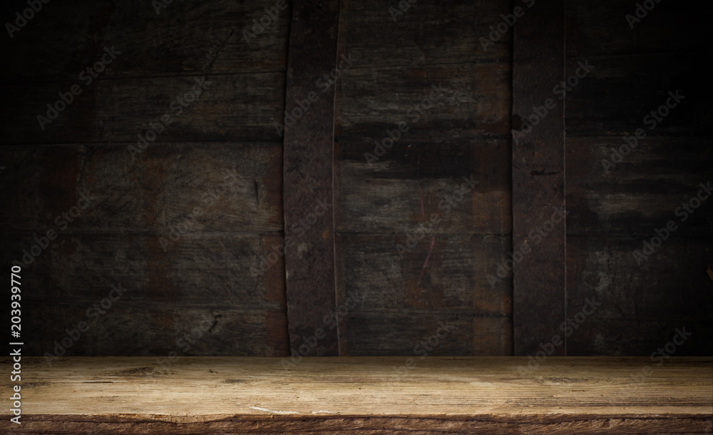background of barrel and worn old table of wood background of barrel and worn old table of wood