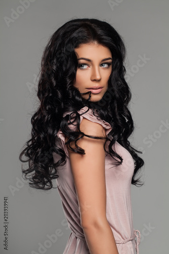 Pretty Brunette Woman with Long Healthy Curly Hair