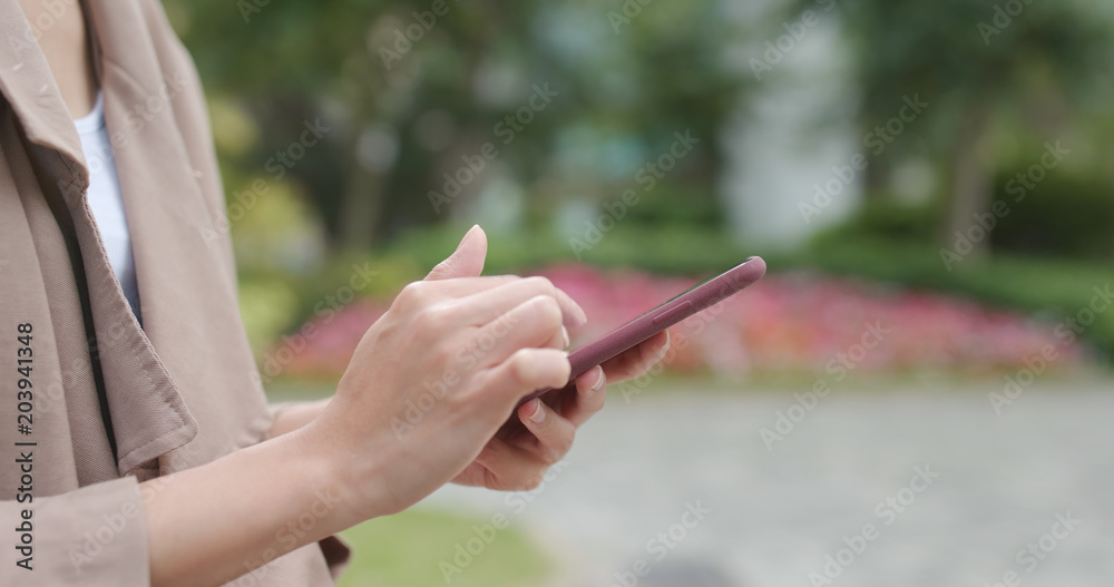 Close up of woman using smart phone