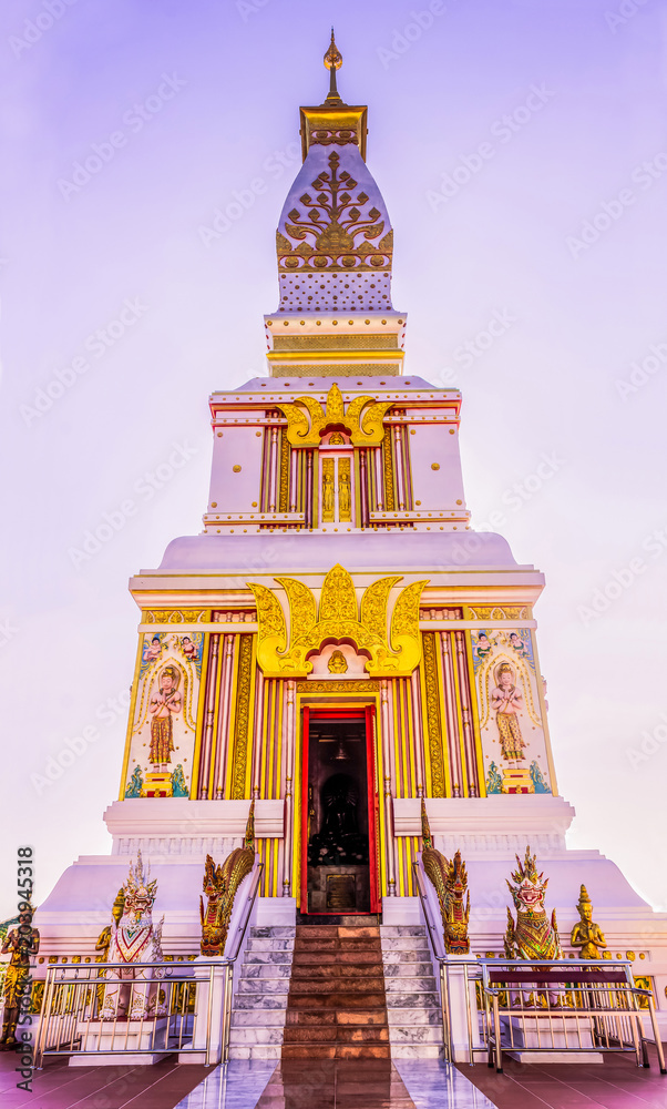 Obraz premium Thai Buddhist pagoda at Doi Thepnimit temple on Patong hilltop. It is the newest landmark for tourists of Phuket, Thailand. It has been built in style of Pra Tat Pra Nom at Northeast of Thailand.