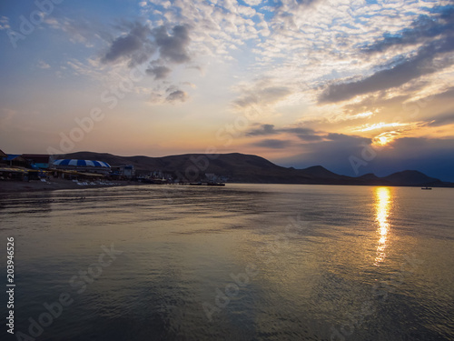 Sunset. Solar path on the sea water. Cape Hamelion. Crimea