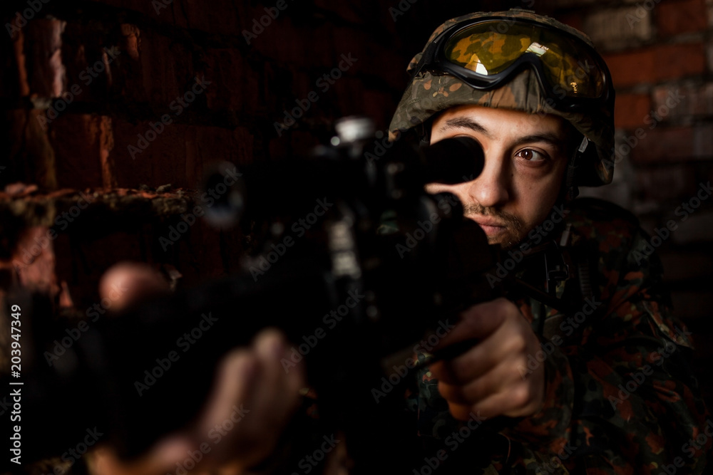 Soldier in the war with arms