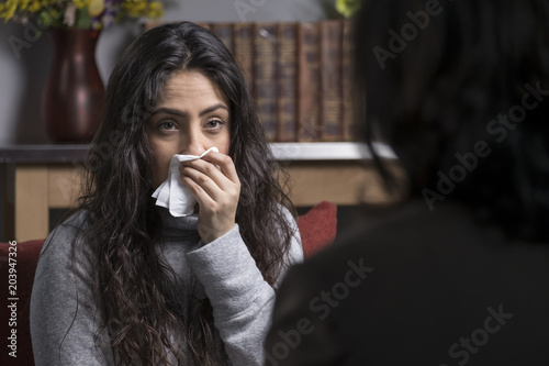 Young woman meeting with her therapist