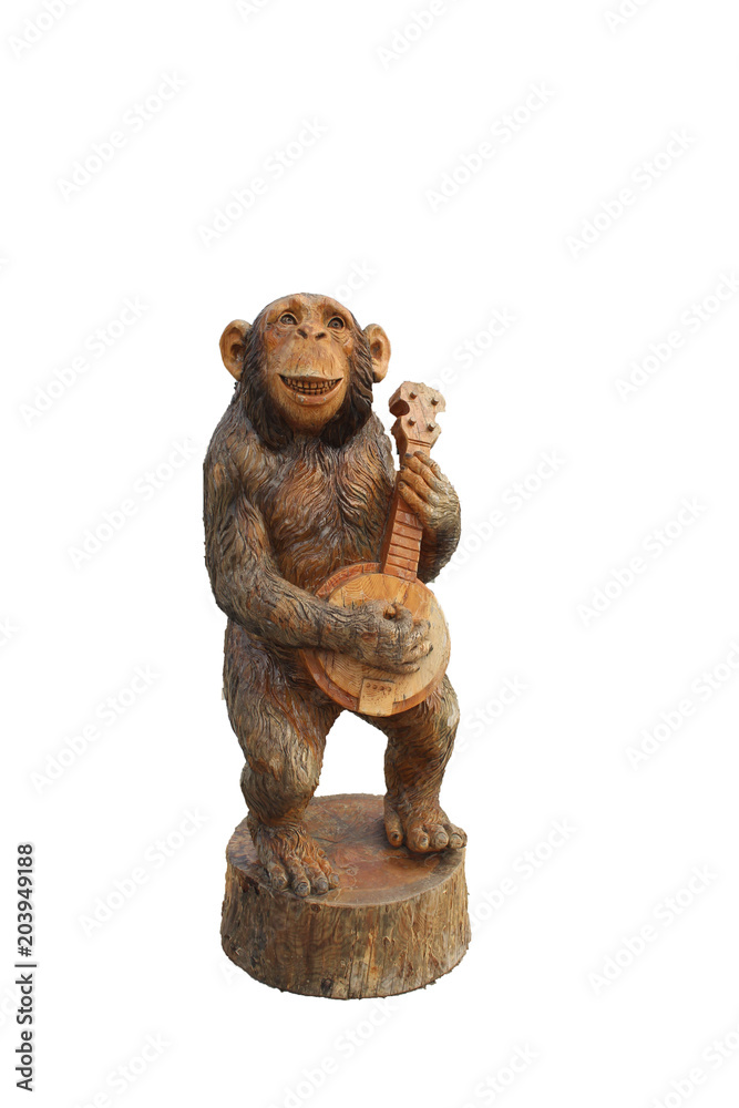 Monkey plays the guitar, the figure of a tree